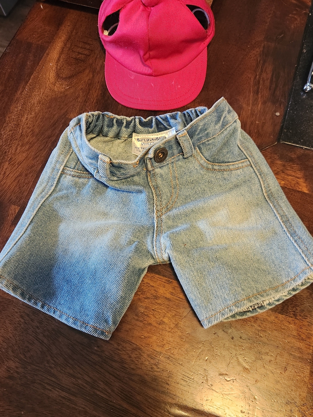 Build-A-Bear Light Blue Denim Shorts and Red Ball Cap.